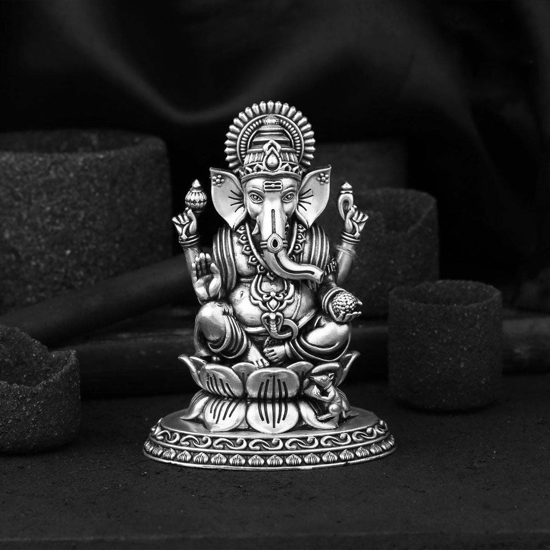 Invite wisdom and success into your workspace or home with this stunningly detailed Ganesha idol. A perfect centerpiece for new beginnings.